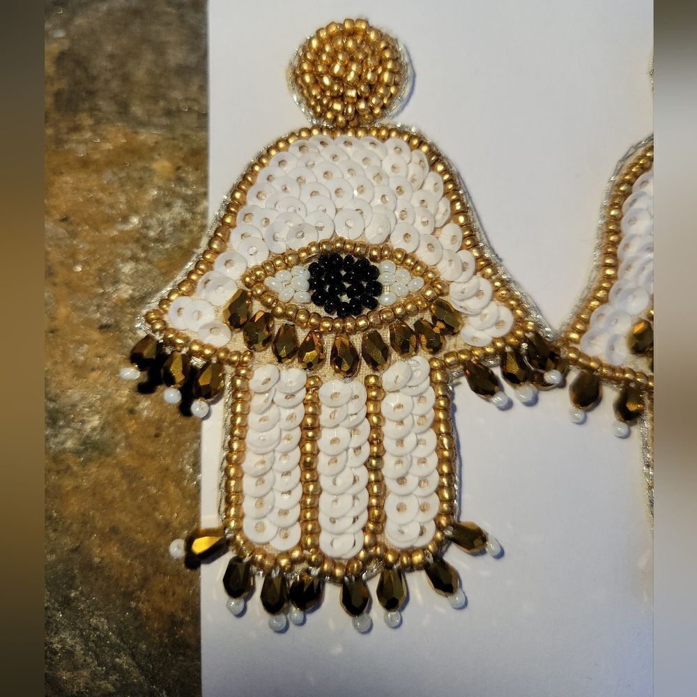 White Seeded Beaded Hamsa Design Earrings In Goldtone View 3